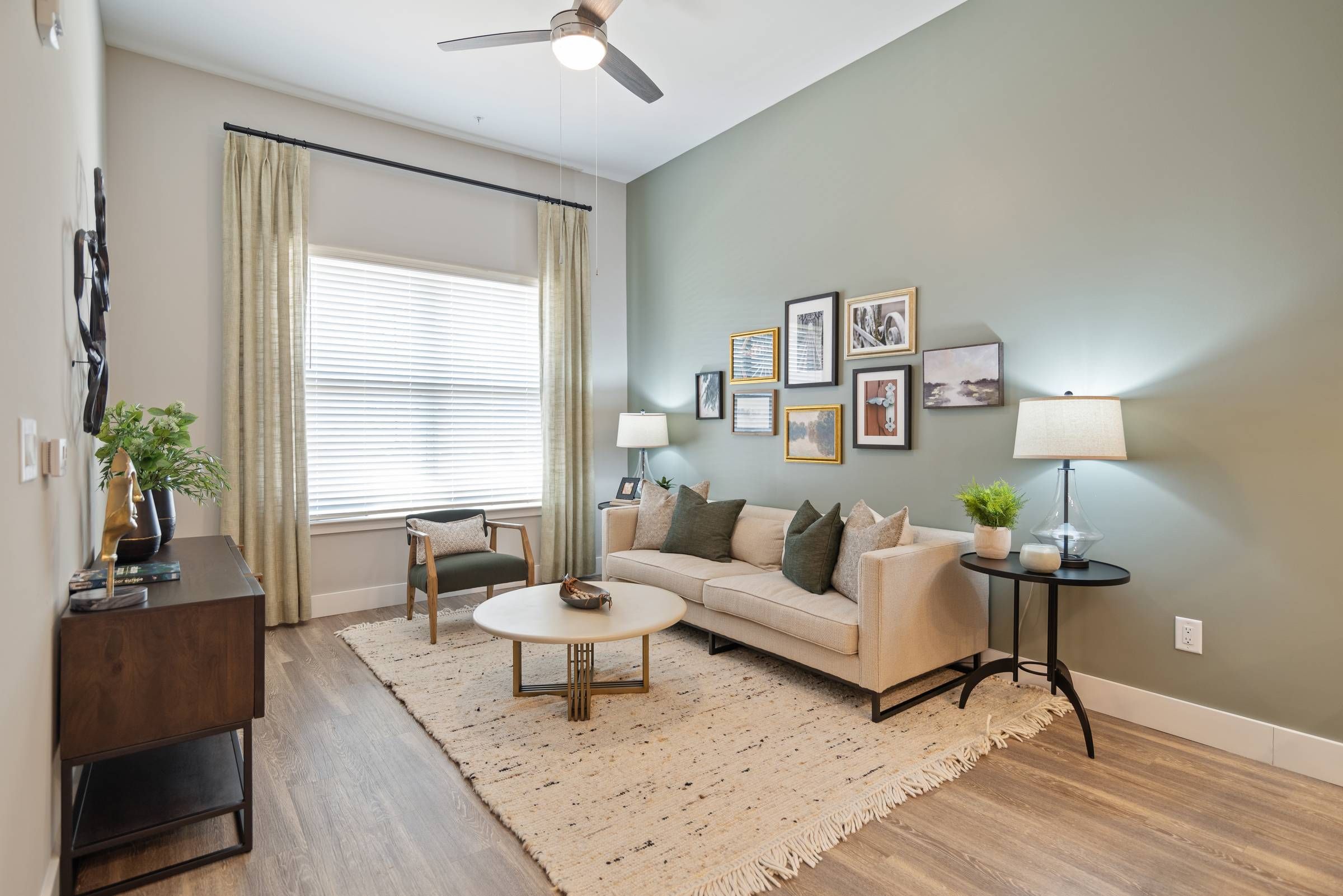 Alta Depot modern living room featuring a couch, coffee table, and TV.