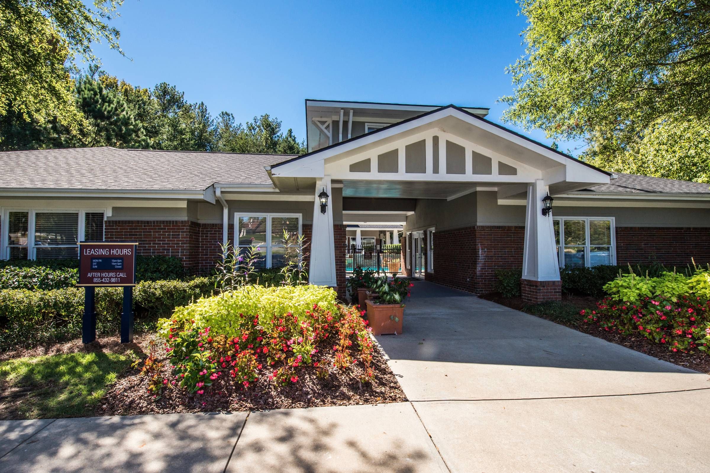 Altera Riverside clubhouse entrance with gate to the resident pool.