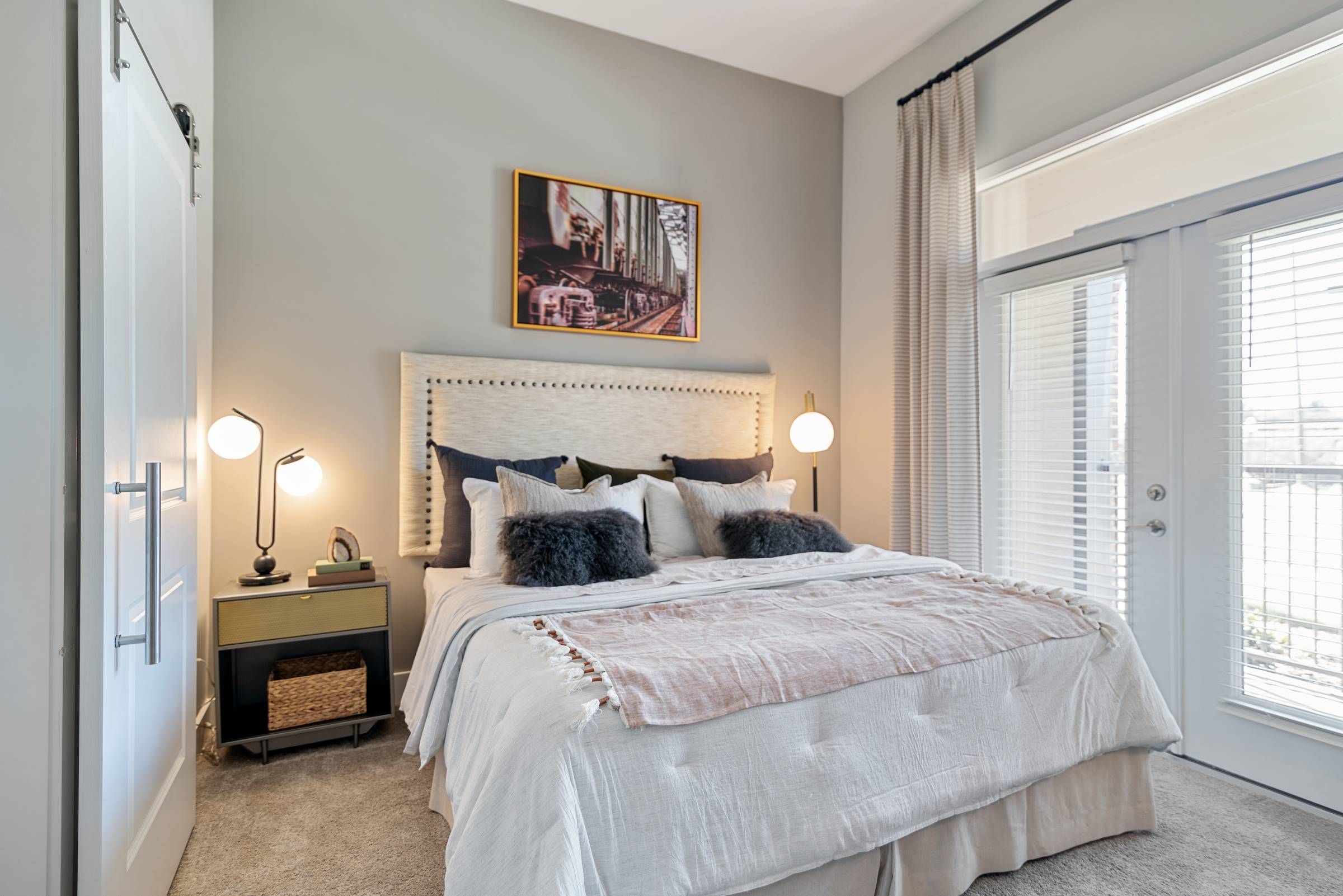 Alta Depot bedroom with double door with windows.
