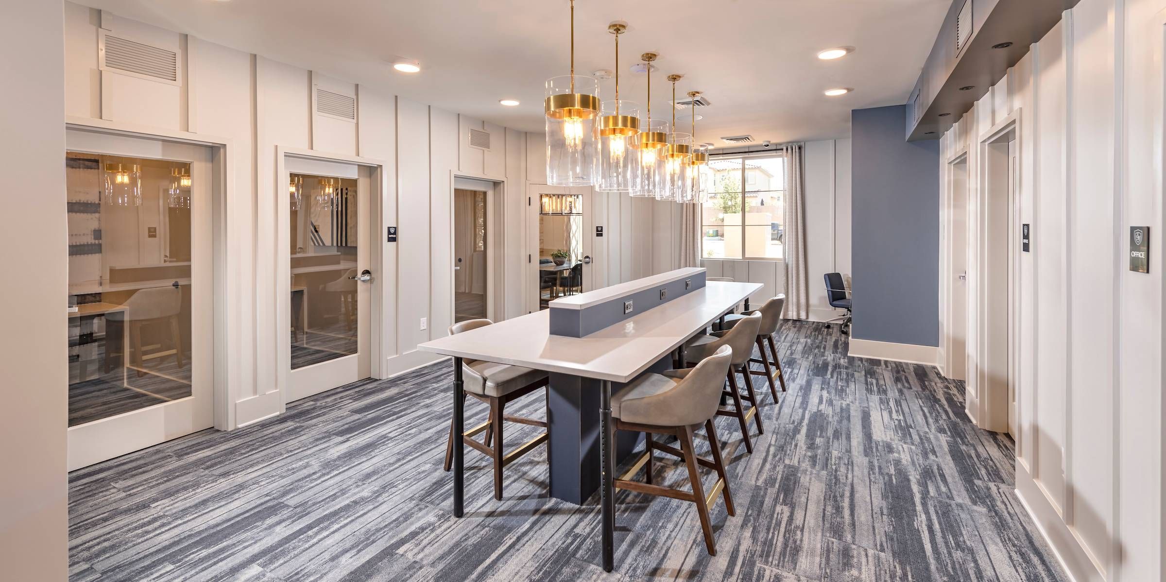 Alta Southern Highlands provides a professional coworking space with sleek desks and elegant lighting.