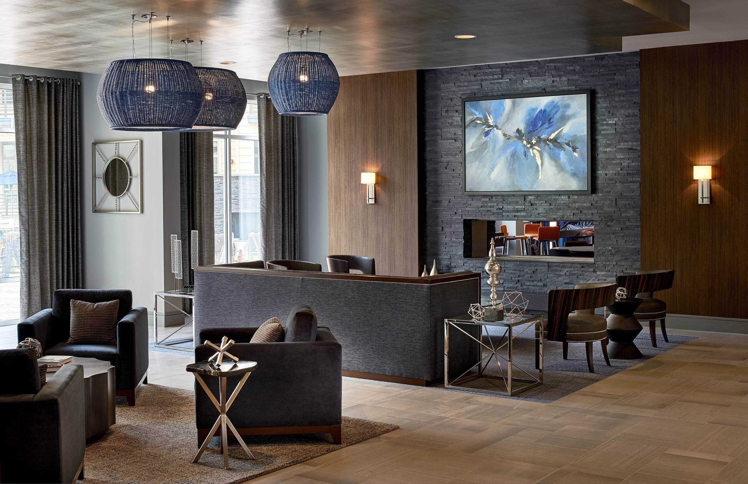 Evolution at Towne Center Laurel upscale clubhouse lounge area with seating and modern decor.