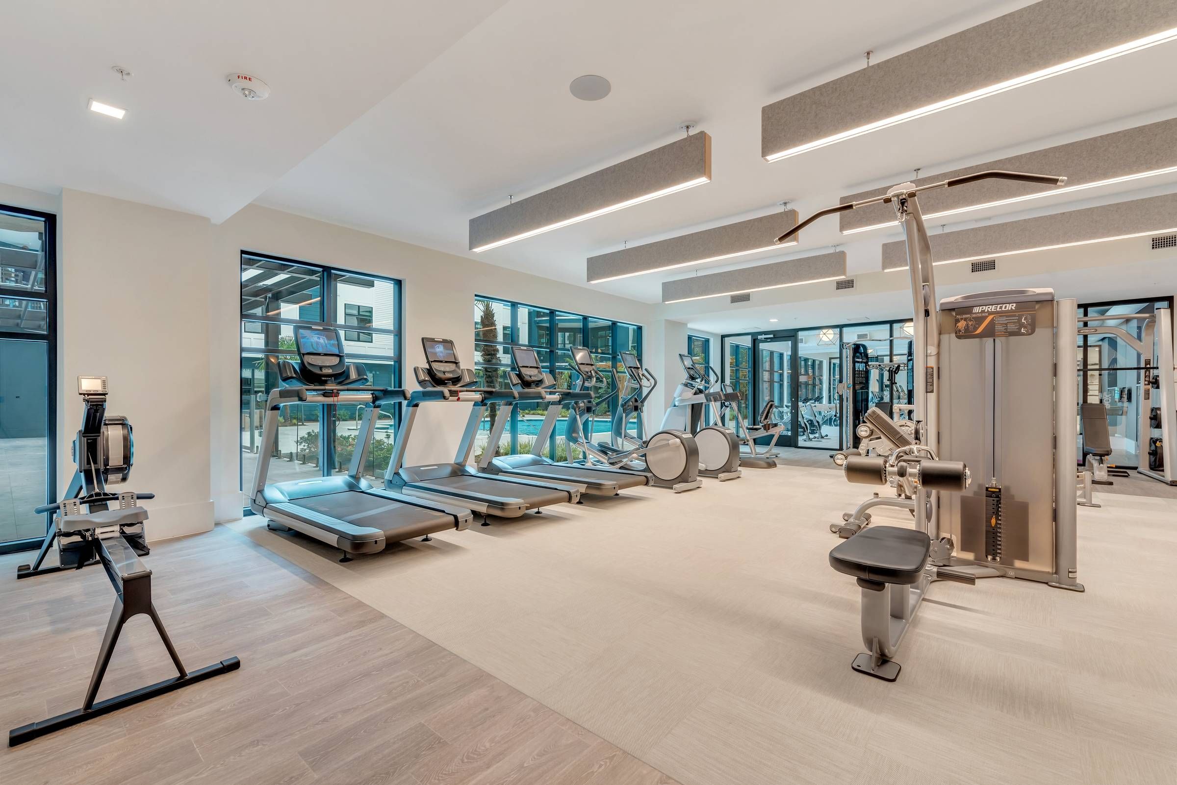 Alta Purl bright fitness center with exercise machines.