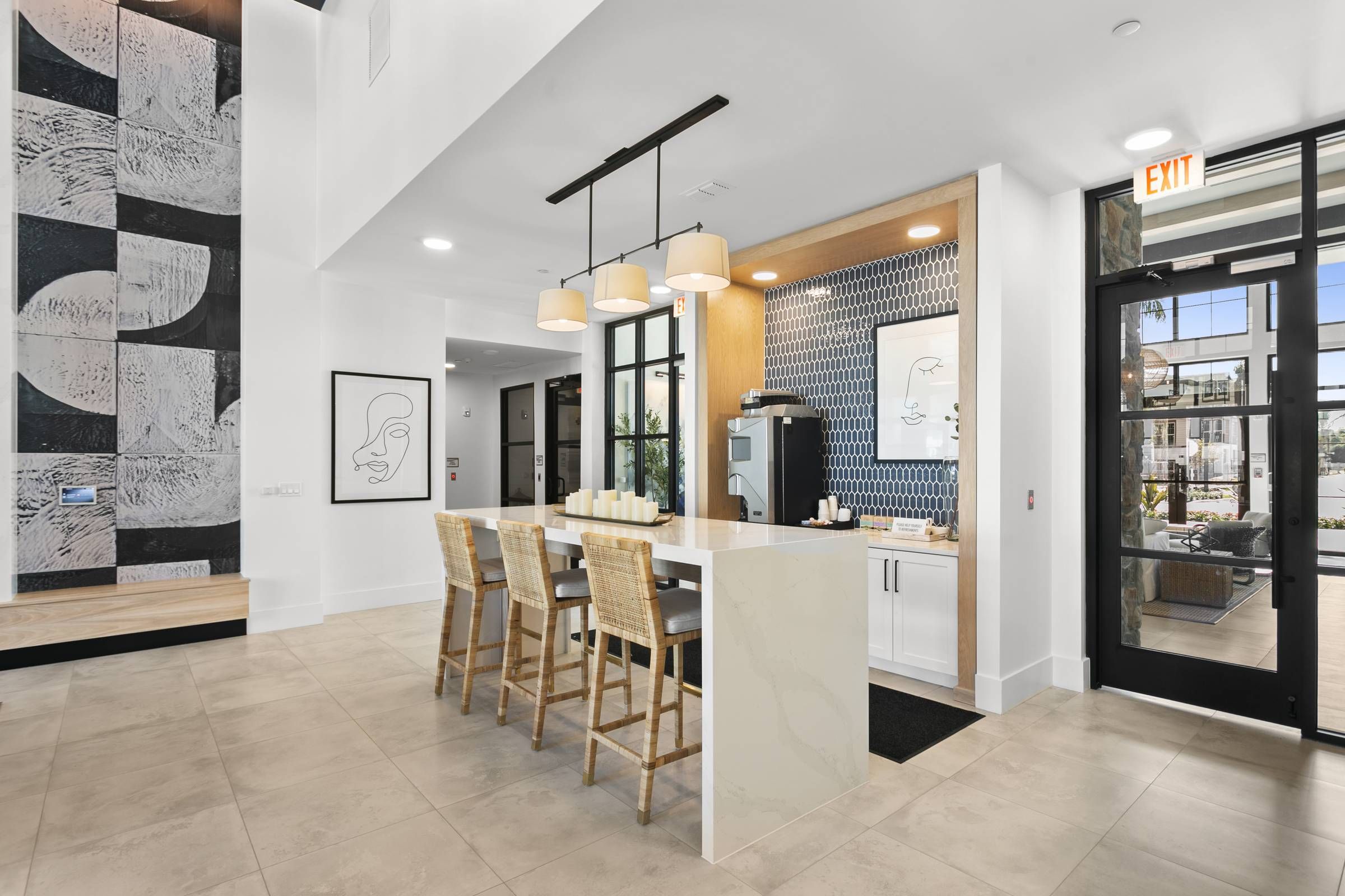 A contemporary coffee and snack bar area with barstool seating at Alta Clearwater.