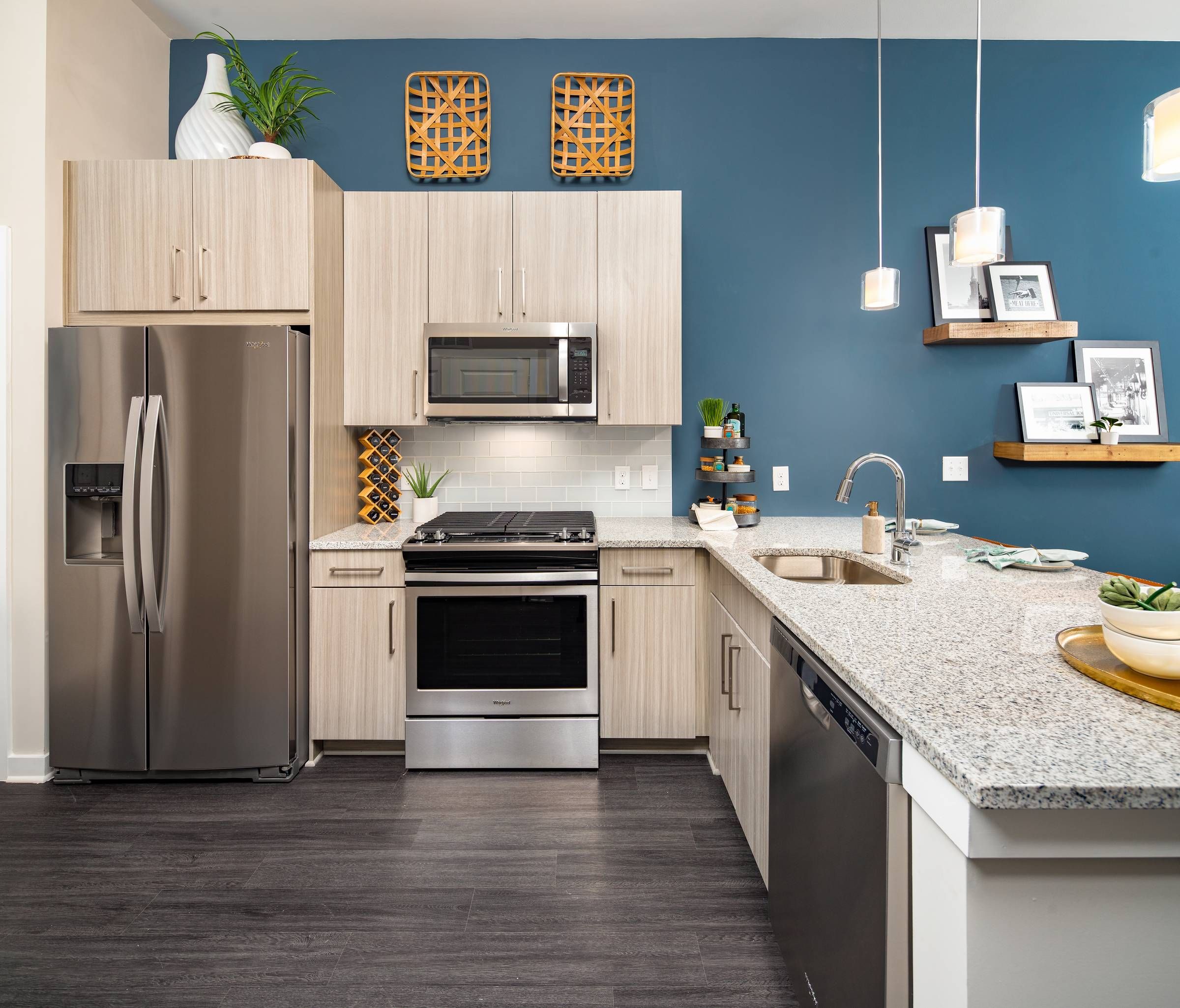 Another angle of the modern kitchen at Alta Sugarloaf, highlighting the granite countertops and state-of-the-art appliances.