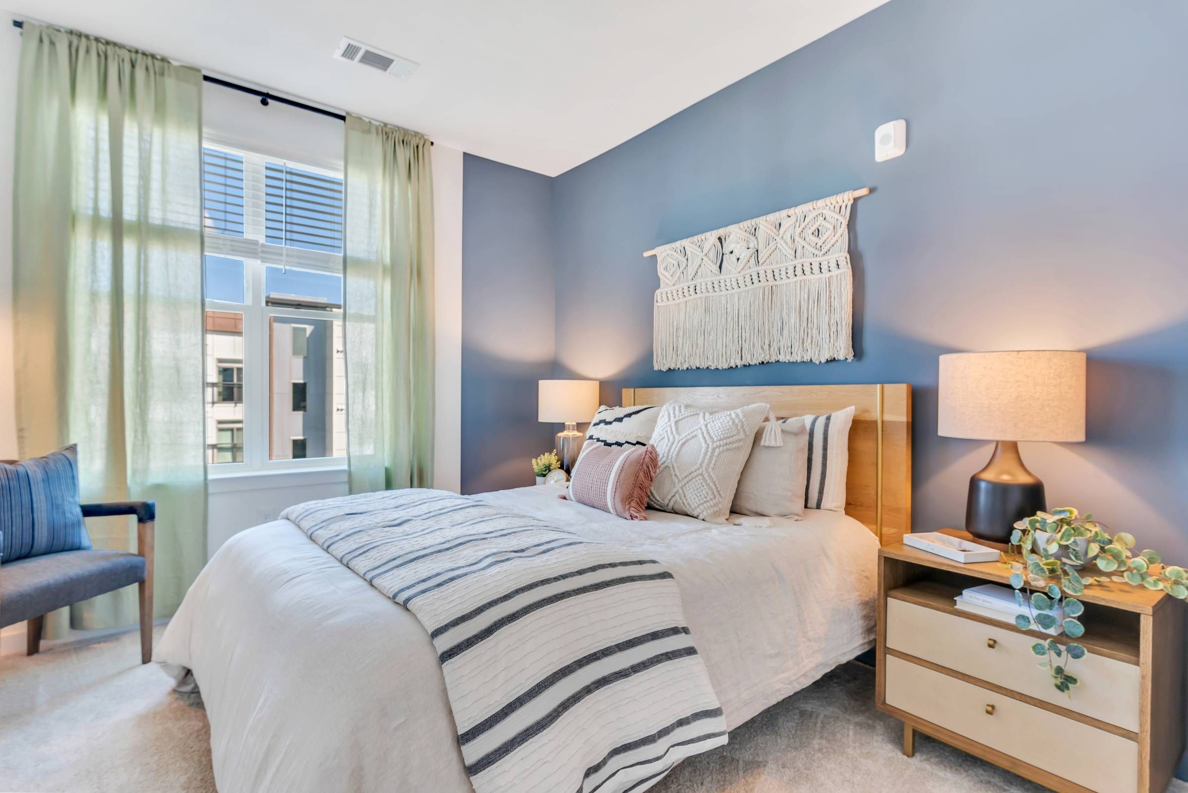 Alta Purl bedroom with carpet and large window.